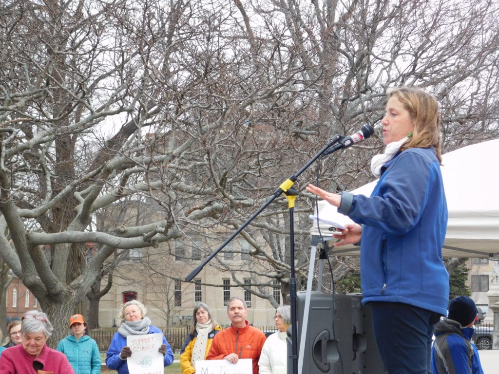 Laura Zitske addresses the March for Science in Portland, Maine.