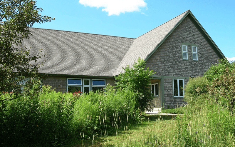 Fields Pond Audubon Center building in summer