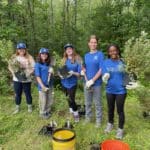 Portland Youth Corps planting native plants June 2022