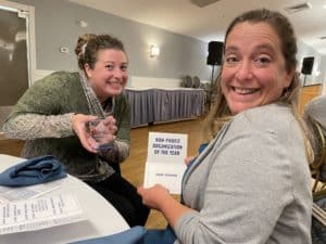 Biologist Laura Williams (left) and Coastal Birds Project Director Laura Minich Zitske and accepted the award on behalf of Maine Audubon. 