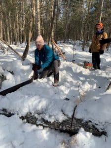 Jennifer Post does trail work at Mast Landing