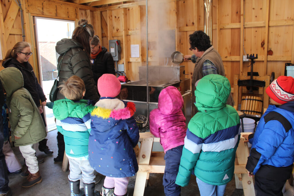 Kindergarteners visit the Sugar House at Portland Arts and Technology High School