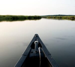 Bow of a canoe during SMAC sunset canoe tour